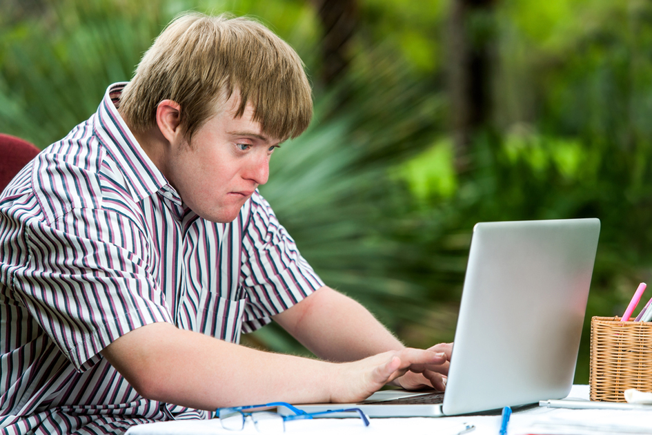 Young person using a laptop