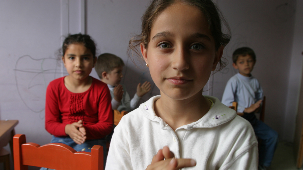 Children clap to music in a preschool at the Social Services and Child Protection agency in Istanbul