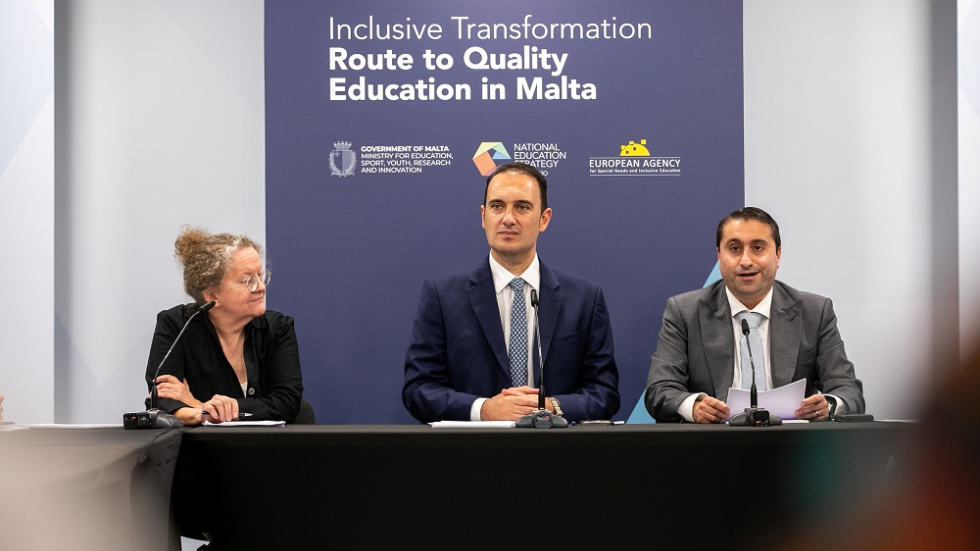 L–R: Amanda Watkins (Assistant Director of the Agency), Clifton Grima (Minister for Education, Sport, Youth, Research and Innovation) and Matthew Vella (Permanent Secretary) present at the launch event Three people presenting in front of an audience
