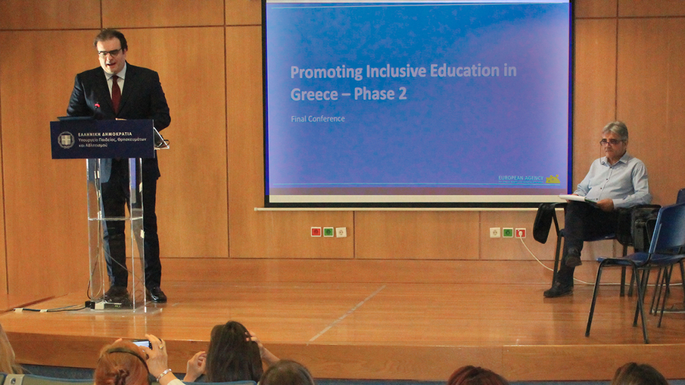 Minister of Education, Kyriakos Pierrakakis, delivers his opening speech at the conference, with Giannis Bousdounis, Director of the Department of Special Needs, seated to his right. Minister of Education, Kyriakos Pierrakakis, delivers his opening speech at the conference, with Giannis Bousdounis, Director of the Department of Special Needs, seated to his right.
