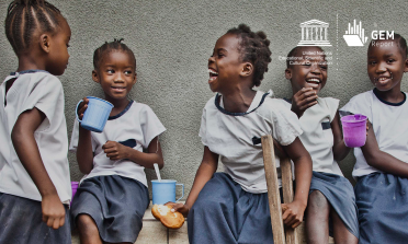 Image of schoolgirls having lunch. Title: There has been a huge leap forward in girls' education over the past 25 years. #Iamthe1stGirl. Logos: UNESCO, GEM Report