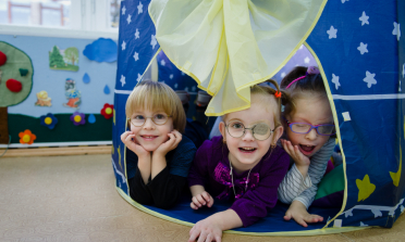 Children playing in a tent in a kindergarten in Belarus