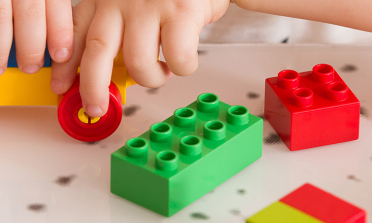 A child playing with building blocks