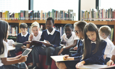 Young people in a school library setting