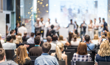 People sitting in a conference room