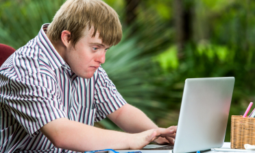 young man working at a computer