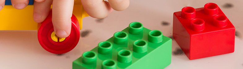 A child playing with building blocks