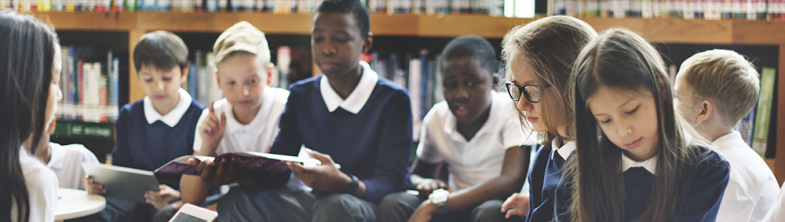 Image of young people in a school library setting