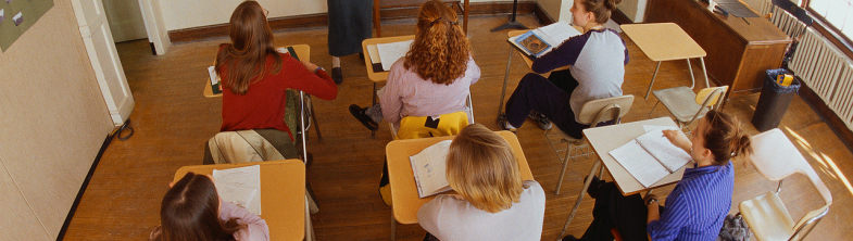 photo of teacher with students
