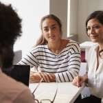 Three adults having a discussion
