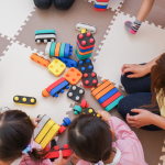 Children playing with colourful blocks