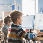 Children using computers in a classroom