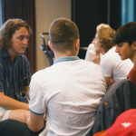 Three young people having a discussion