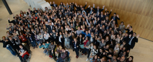 image of young people at a conference gathering
